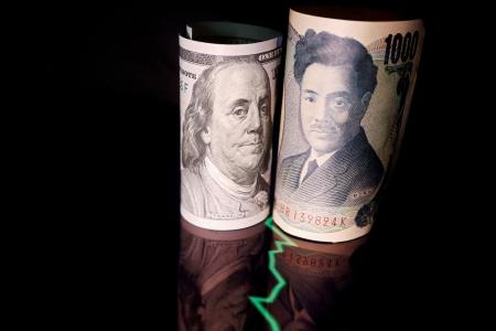 　日本円と米ドル（ロイター＝共同）