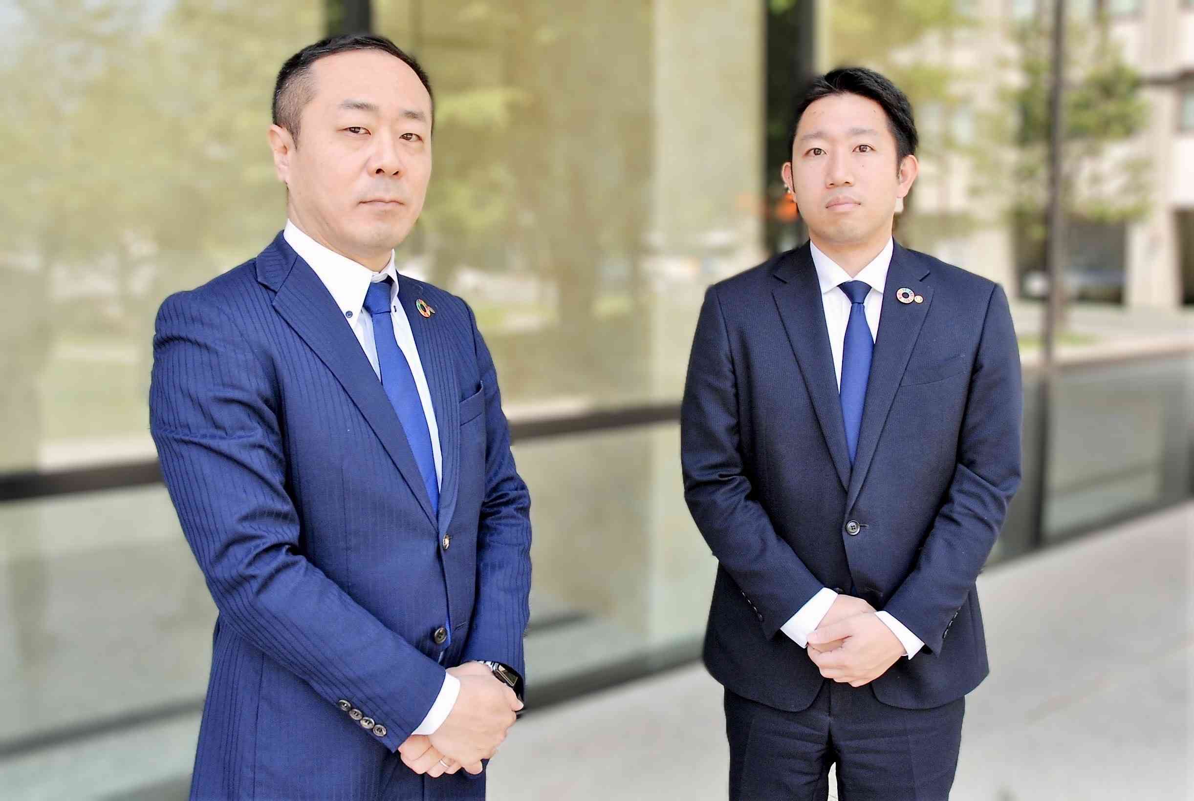 実証実験を企画した肥後銀行経営企画部の永野栄一さん（左）と田中栄光さん