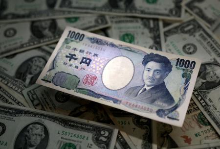 　日本円と米ドル（ロイター＝共同）