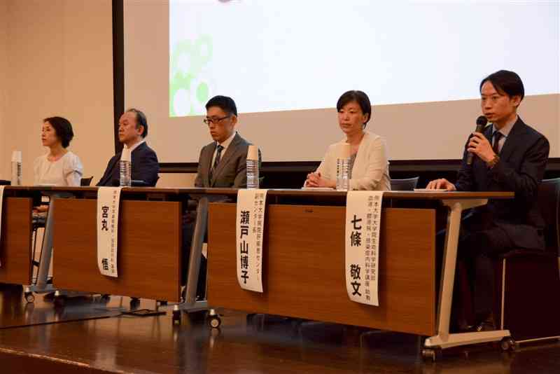 がんの原因となるウイルスや予防法について話す医師ら＝4日、熊本市中央区